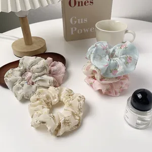Floral organza scrunchie set with silver embroidery in pastel pink and blue colors