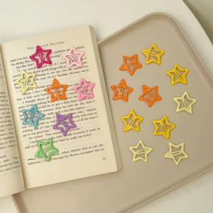 Set de 15 pinzas para el pelo con forma de estrella en colores vibrantes para niñas