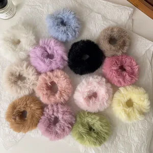 Soft faux fur elastic hair scrunchies in 13 colors displayed on white background