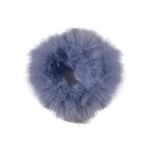 Fuzzy faux fur scrunchie in soft lavender purple with high elastic band hair accessory