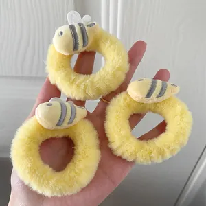 Three-piece set of cute plush bee hair ties in soft yellow coral fleece material
