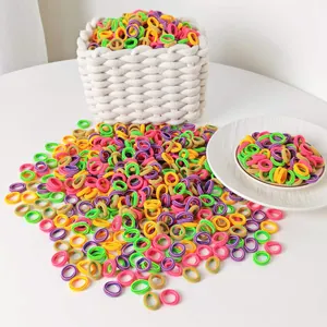 Bulk set of 2cm candy-colored high elasticity hair ties for kids in a white basket