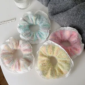 Set of four autumn lace-edged knit scrunchies with pearls and soft yarn texture