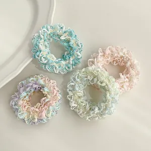 Lot de quatre chouchous XL couleurs pastel en tissu éponge doux style académique