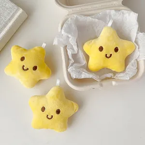 Lindos colgantes de estrella de peluche amarillo con caras sonrientes para bolsos