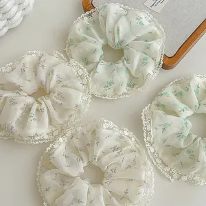 Floral chiffon scrunchies with white lace edges in lavender and pale green set