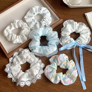 Ensemble d'élastiques à cheveux fleuris bleu et blanc avec dentelle et ruban