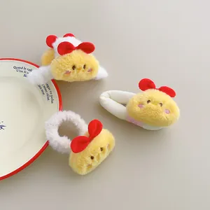 Cute plush yellow chick hair claw with red bow tie accessory for autumn and winter