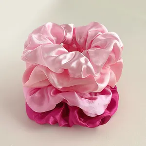Set of 4 gradient pink satin scrunchies with elegant silk-like glossy finish