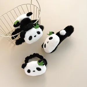 Cute plush panda hair accessory set including scrunchie, claw clip, and pin with bamboo leaf
