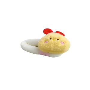 Cute plush chick hair scrunchie with pink bow and embroidered details on white background