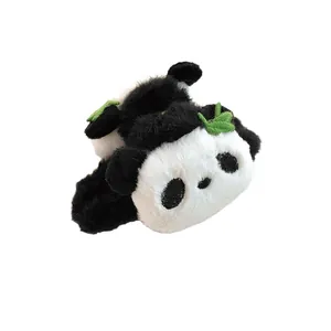 Cute panda plush hair claw clip with green bamboo leaf embroidery on white background