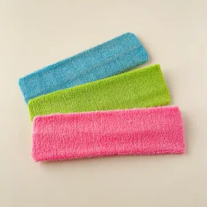 Three vibrant sports headbands in blue green and pink made of soft absorbent terry cloth