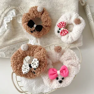 Set de cuatro coleteros de peluche con forma de osito y lazos en textura suave