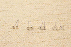 Macro view of S925 sterling silver bowl-shaped earring posts for DIY jewelry settings