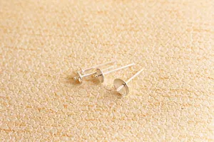 Macro view of S925 sterling silver cup post earrings for DIY pearl jewelry making