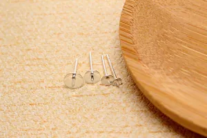Detailed view of four S925 sterling silver ear studs for DIY pearl and crystal mounting