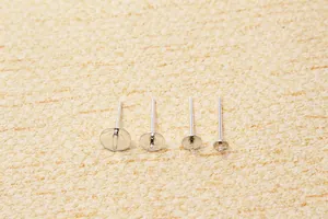 Detailed macro of S925 sterling silver ear studs in four sizes for DIY jewelry making