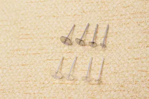 Macro shot of 8 silver S925 sterling silver cup posts for DIY pearl earring jewelry making