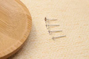 Macro shot of S925 sterling silver DIY ear studs bases in four sizes for jewelry making