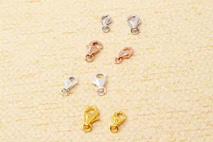 Details von Karabinerverschlüssen aus 925er Sterlingsilber in Gold, Silber und Roségold