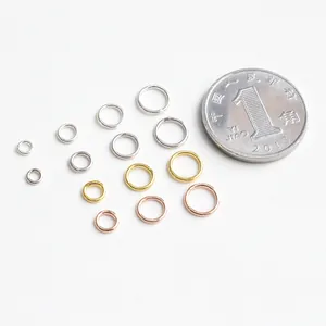 Macro view of tiny S925 sterling silver closed rings in various sizes and finishes