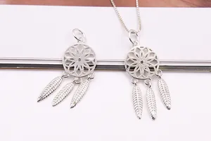 Detailed close-up of S925 sterling silver dreamcatcher pendant with feathers and mandala pattern