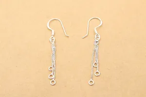 Macro detail of S925 sterling silver long tassel chain earrings for DIY jewelry