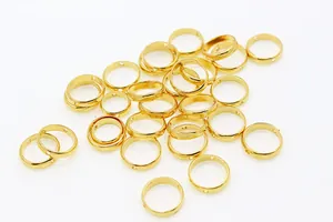 Detail of S925 sterling silver gold-plated hollow bead rings for jewelry making