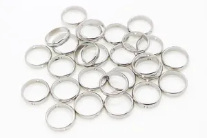 Macro detail of S925 sterling silver hollow ring spacers for DIY bracelet making