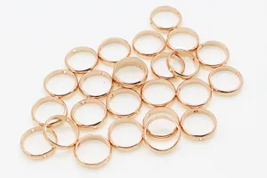 Detailed close-up of rose gold S925 sterling silver hollow beads for DIY jewelry making