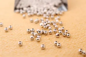 Macro view of polished S925 sterling silver beads for DIY jewelry making