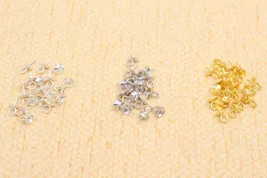 Macro detail of S925 sterling silver pearl cup bails in gold, silver, and black finish