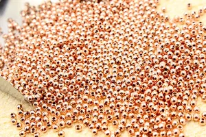 Macro shot of rose gold plated S925 sterling silver beads for DIY jewelry making