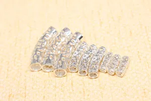 Detailed view of S925 sterling silver hollow floral spacer tubes for DIY jewelry making