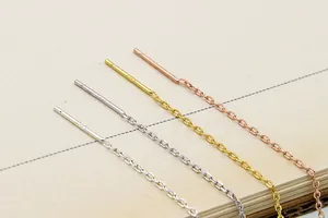 Macro shot of S925 sterling silver box chain earrings showing the S925 hallmark