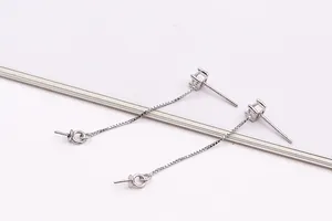 Macro view of S925 sterling silver earring threads with zircon stud and DIY pearl loops