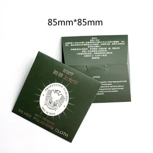 Front and back view of 85x85mm silver polishing cloth in green packaging with instructions