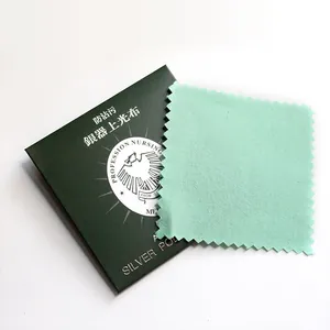 Silver polishing cloth set with cleaning cloth and green packaging for jewelry care