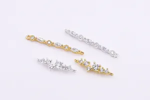 Macro detail of S925 silver bar and cluster charms with zircon for DIY jewelry making
