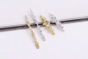 Detail of silver connector charms with pavé cubic zirconia for DIY jewelry making