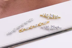Macro detail of S925 silver pendants with cubic zirconia for jewelry making