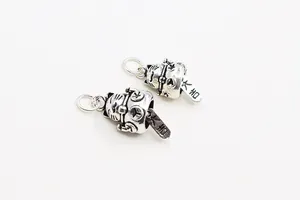 Detailed close-up of vintage S925 sterling silver Maneki Neko lucky cat charms
