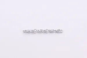 Macro detail of S925 sterling silver bar pendant with micro-set cubic zirconia and hallmark
