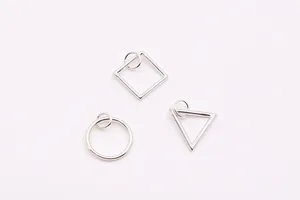 Close-up of S925 sterling silver geometric square, round, and triangle DIY charms