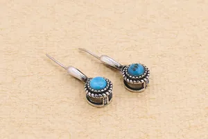 Detailed macro view of S925 sterling silver stamp on vintage turquoise earring hooks