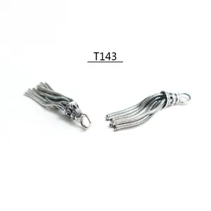 Detailed view of S925 sterling silver vintage tassel pendant with snake chains and engraved cap