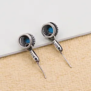 Vintage S925 sterling silver stud earrings with turquoise stones and antique finish