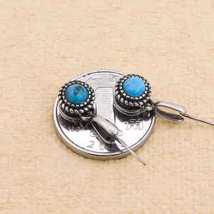 Vintage S925 sterling silver earrings with round turquoise stones and beaded silver edges