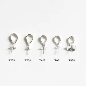 Detailed view of five S925 sterling silver pinch bails for DIY pearl jewelry assembly